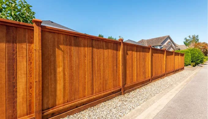 Stunning Wooden Fence Enhances Home Privacy image